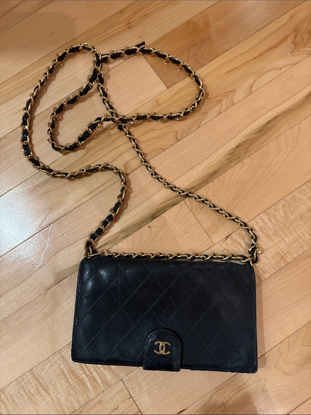 CHANEL Black Quilted Leather Crossbody with Gold Chain